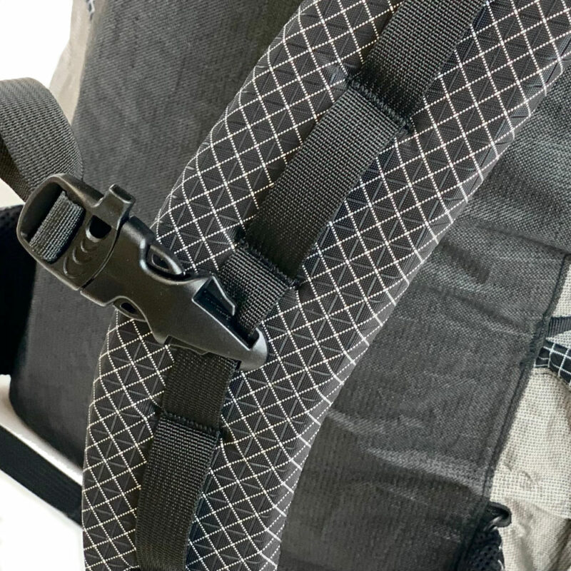 The sternum strap and shoulder strap daisy chain on the MLD Exodus Ultra. The sternum strap has a built-in whistle.
