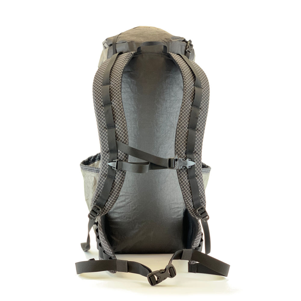 A back view of the MLD Prophet showing the shoulder straps, sternum strap, and hipbelt.