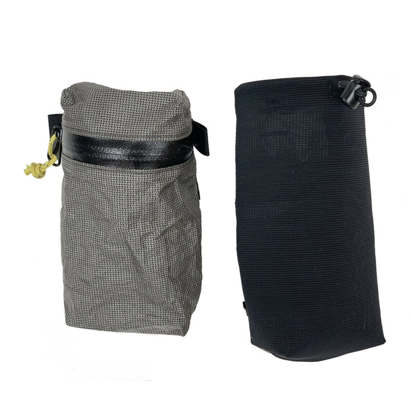 A front view of the MLD Shoulder Pockets. The zippered pocket is on the left, and the water bottle holder is on the right.