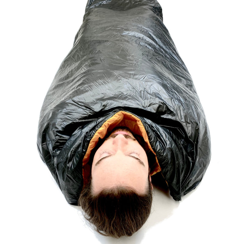 The head view of a Vision Quilt. A guy is sleeping in it.