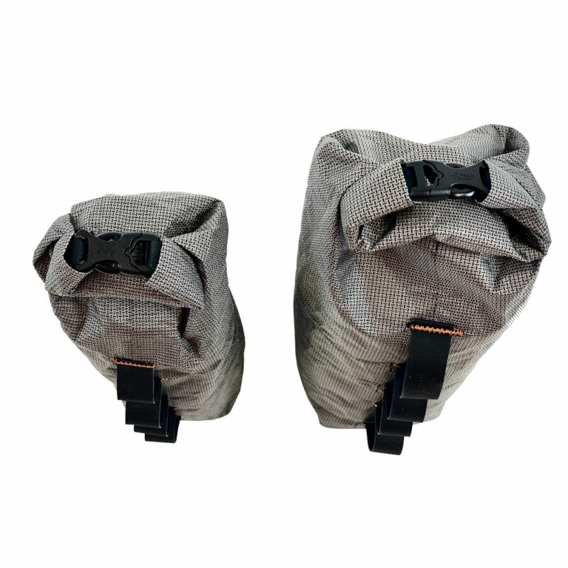 A top view of the Ultra Fork Dry Bags with the 1.6L on the left and the 2.5L on the right. Daisy chain is visible on side, and roll-top is visible on top