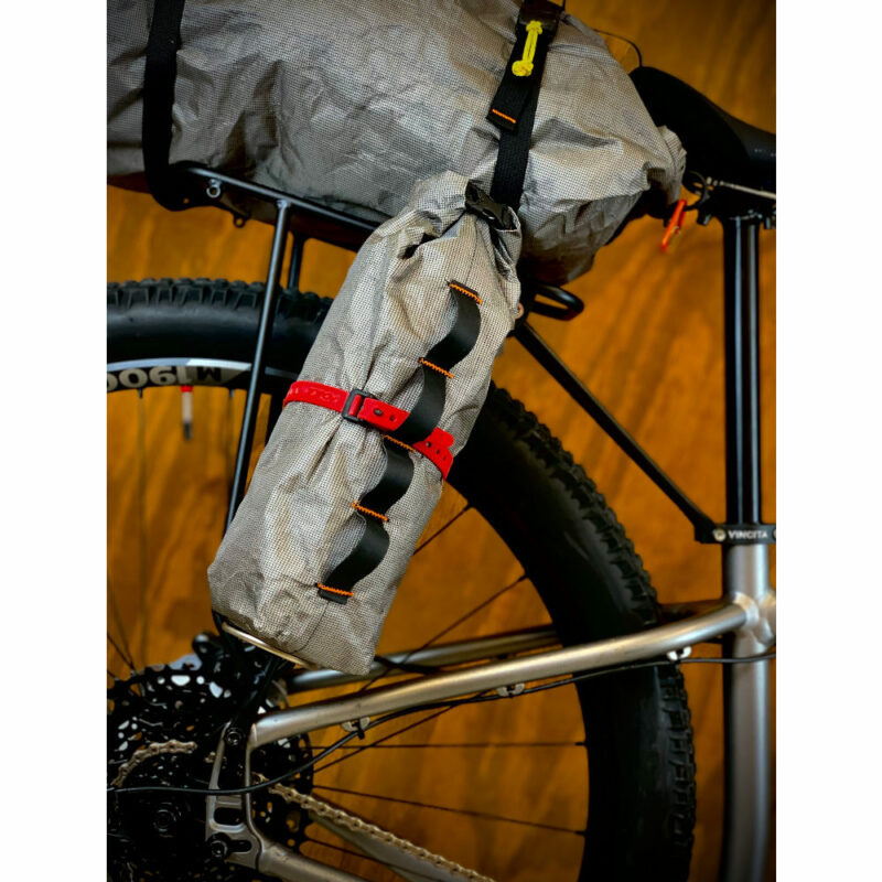 The 2.5 L Ultra Fork Dry Bags on a Bike's back fork.