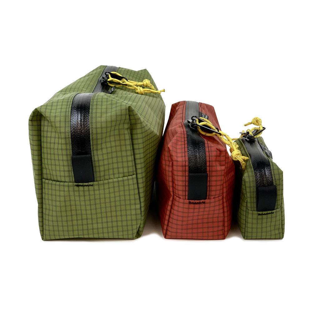 A side view of the UltraGrid Packing Cubes in sizes Large, Medium, and Small (left to right.)