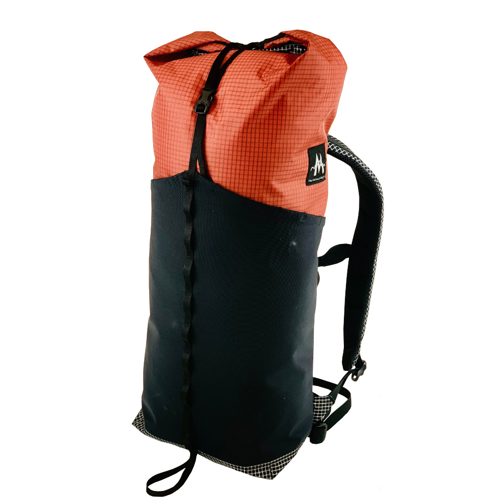 A 3/4 front view of the MLD Hell Pack in Red Chili UltraGrid