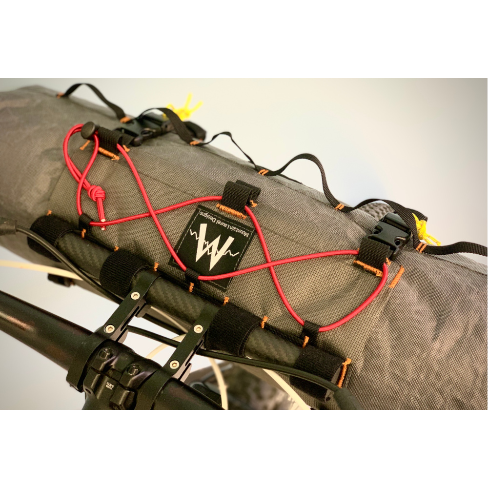 A top view of the Border Handlebar System showing bungee cord, mount bar, and top of harness.