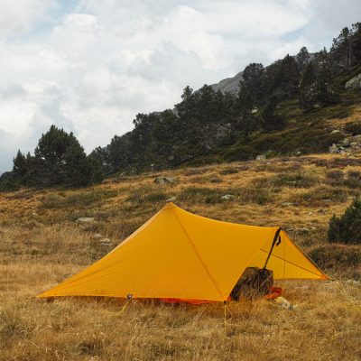 A LittleStar Pitched in a meadow with the entrance facing forward