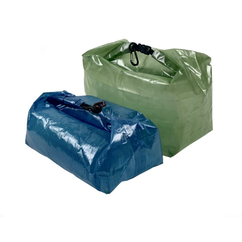 MLD Roll Top Ultralight Packing Cubes have a volume capacity of 4 - 13 Liters depending on how low they are rolled. In the image, they are rolled to two different heights.
