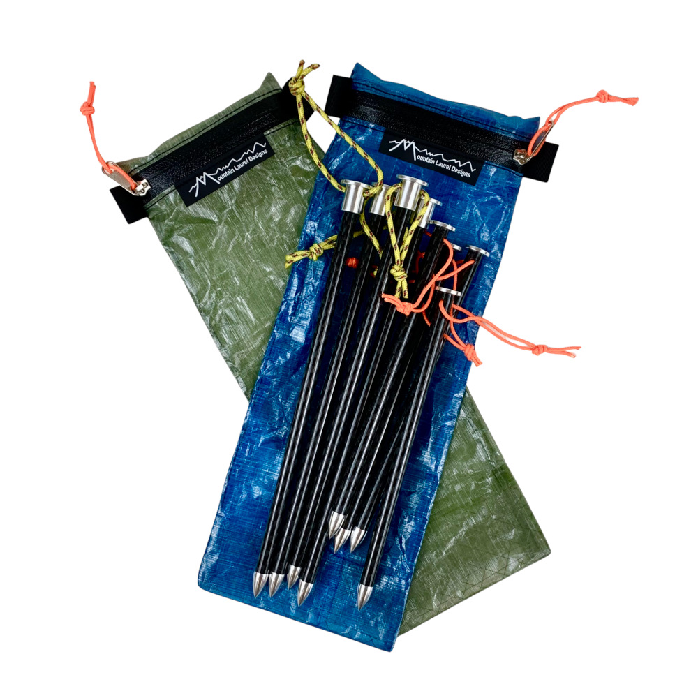 Four 8.5" stakes and four 6.5" stakes ontop of add on stake sacks